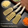 708c6543-e617-4d67-ac33-8aff89d4f80b.jpg Stainless Steel Multi-Purpose Grater Vegetable & Cheese Shredder
