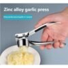 bf88eb83fdd9fd42fc899f573cd1a45e_1766124198100.jpg Stainless Steel Garlic Press Crusher